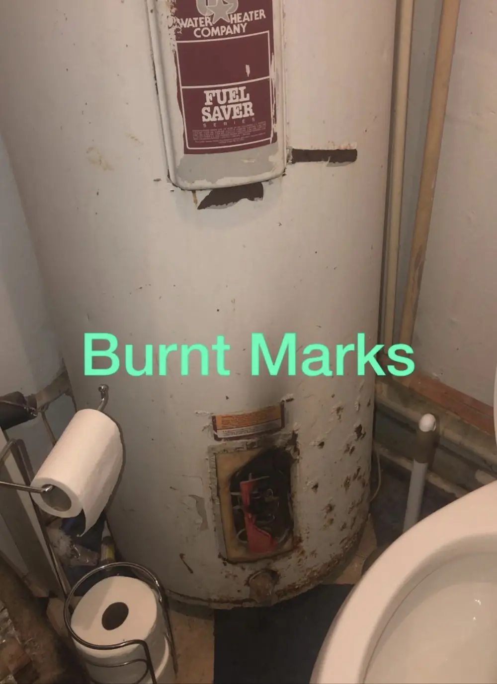Fire damage found at a water heater during an inspection