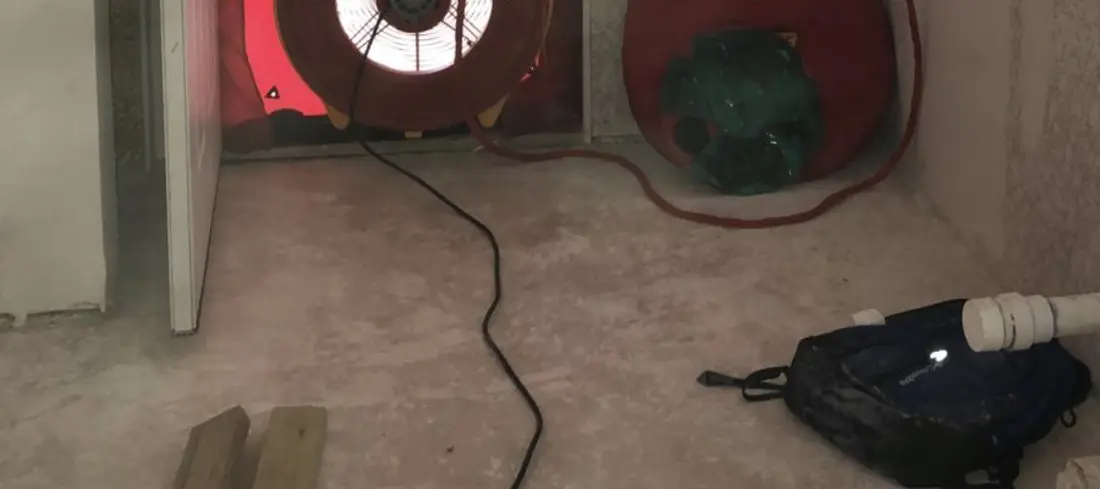 Blower door fan installed in a doorway